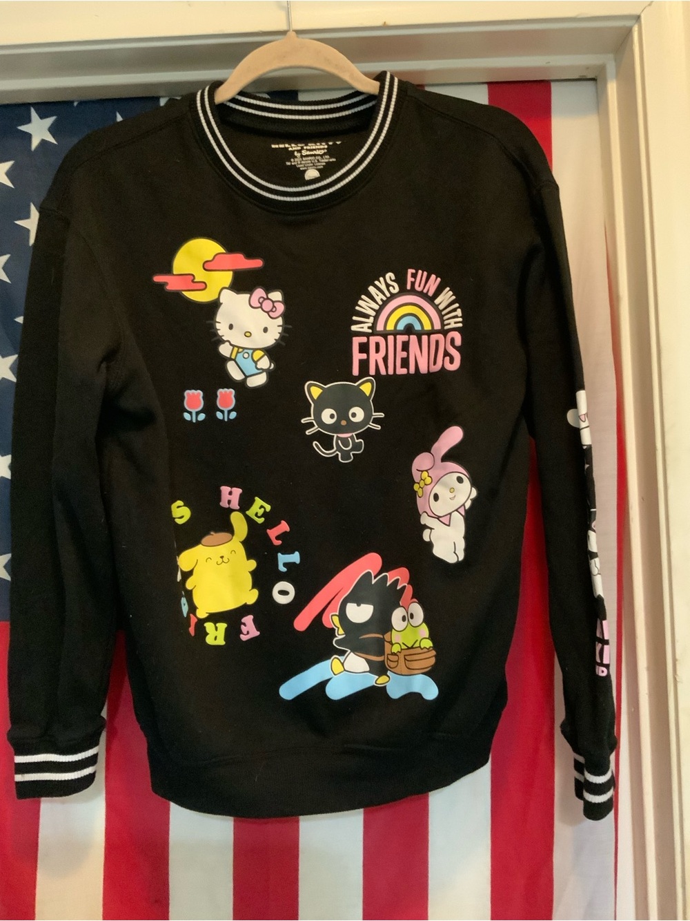 Sanrio Black Crewneck Sweatshirt with Colorful Hello Kitty & Friends Graphics